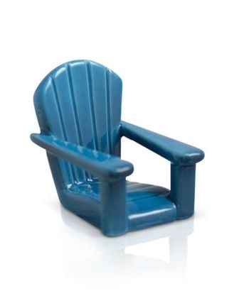 Blue Adirondack-style mini chair figurine on a white background.