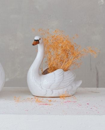 white/orange stoneware swan planter