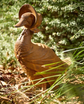 mrs. duck cast iron sculpture
