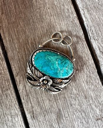 large turquoise oval floral pendant