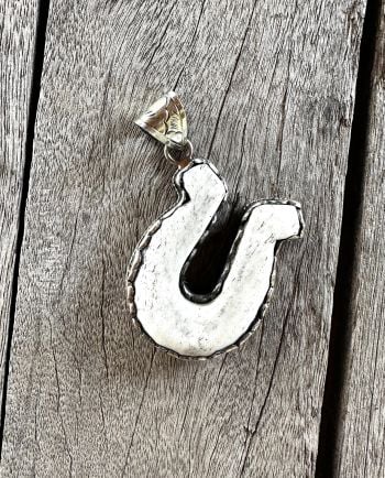 bone horseshoe pendant
