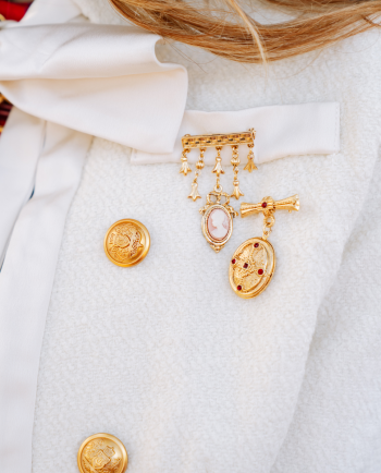 gold/red sacred locket brooch