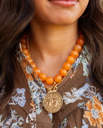 yochi ny orange/gold coin necklace