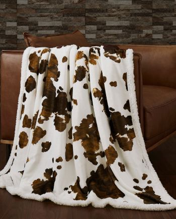 elsa cowhide sherpa throw - available in black or brown!