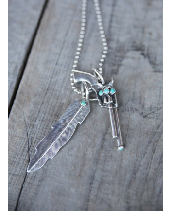 Richard Schmidt gun with turquoise pendant