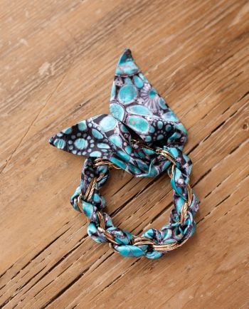 turquoise gem medallion phone chain